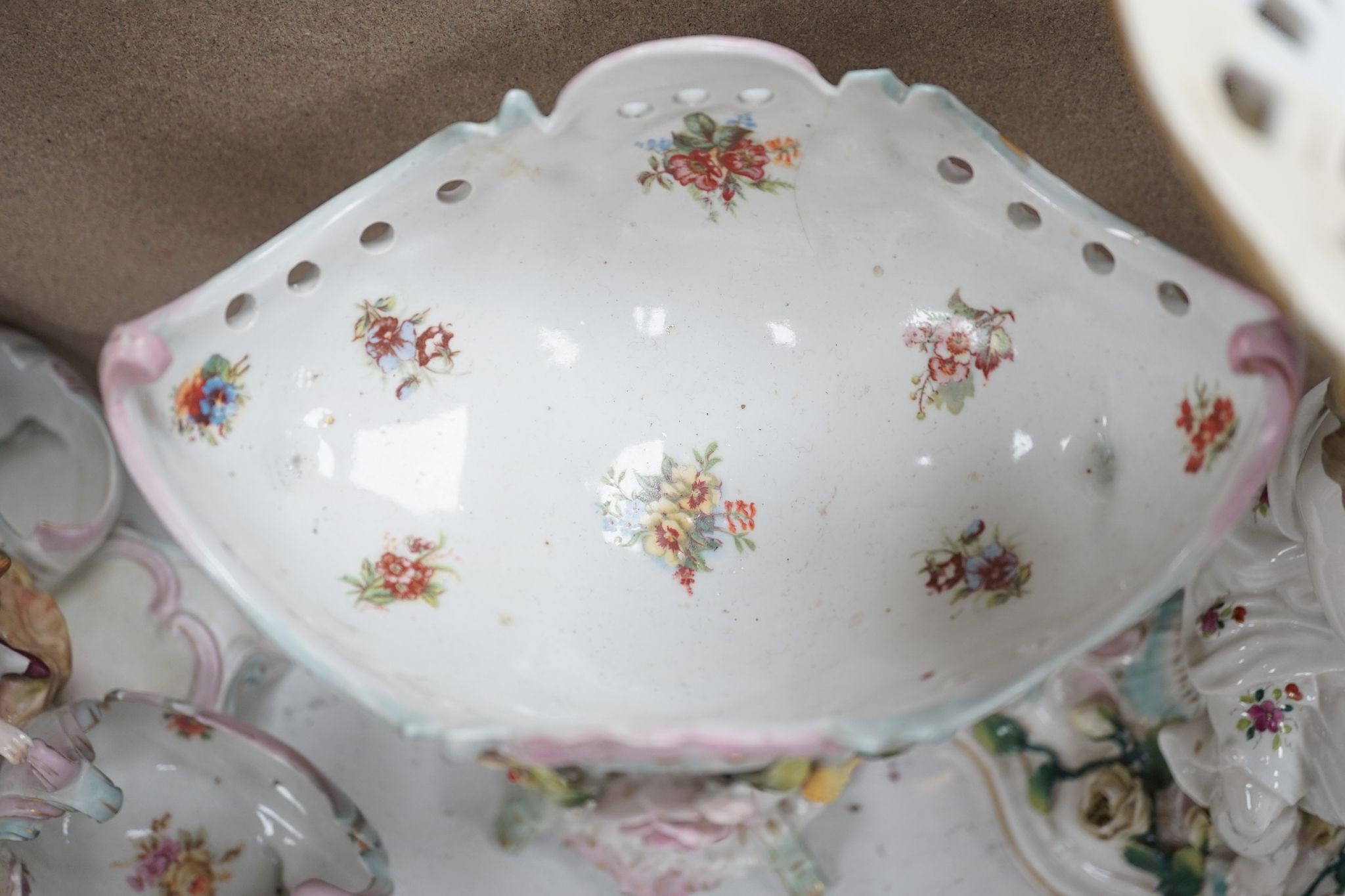 A tall German porcelain figural centrepiece bowl and two others smaller. Tallest 47cm